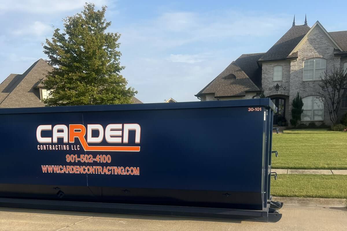 Roll-off dumpster on a residential job site